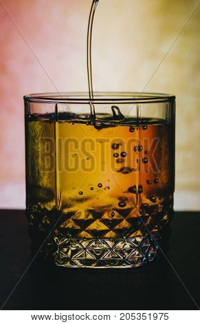 Red alcohol cocktail on the bar table