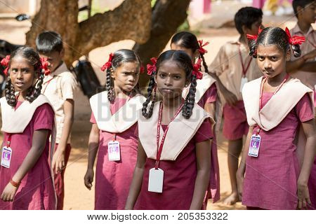 PONDICHERY PUDUCHERY INDIA - SSEPTEMBER 04 2017. School parade of each monday morning with children students in uniforms. They walk sing and pray before going in the classrooms.