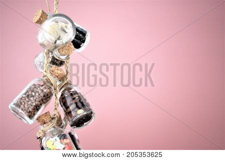 Collection of grain products, lentils, soybeans and red beans in storage jars over on free background. Quinoa, bulgur and couscous cereals. Vegetarian and
