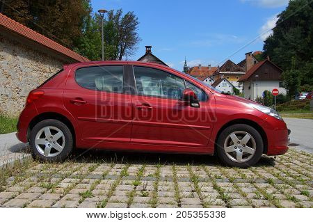 Skofja Loka, Slovenia - August 7, 2017: Peugeot 207 parked on a public parking lot in the city of Skofje Loka. Nobody in de vehicle.