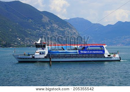 Iseo Lake, Italia - August 16, 2017: Ferry Lake Iseo passing by.