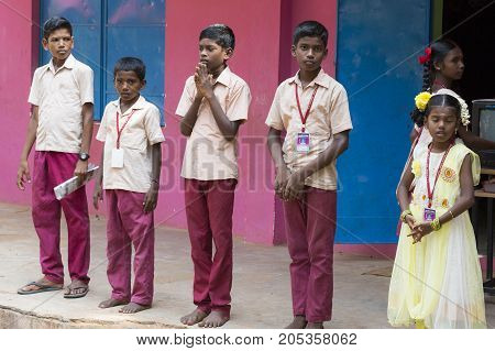 PONDICHERY PUDUCHERY INDIA - SSEPTEMBER 04 2017. School parade of each monday morning with children students in uniforms. They walk sing and pray before going in the classrooms.