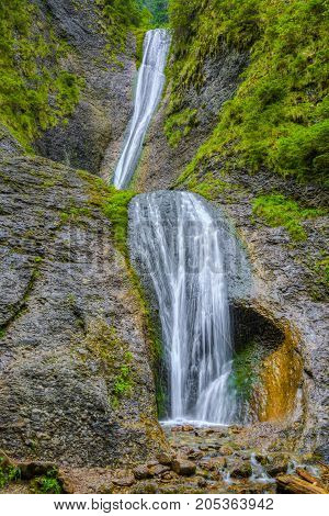 The beautiful Duruitoarea waterfall located in the heart of Ceahlau Massif MoldaviaRomania.