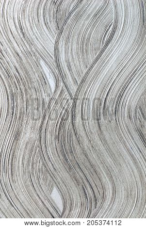 An abstract image of a textured wall from an old piece of discarded sheetrock.