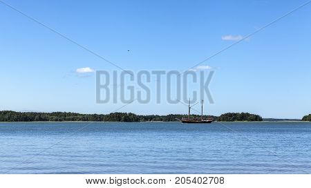 BALTIC SEA, ALAND ON JULY 01. View of a sailboat, the Baltic Sea and the archipelago on July 01, 2017 in Baltic Sea, Finland. Sunny day at sea. Unidentified boat. Editorial use.