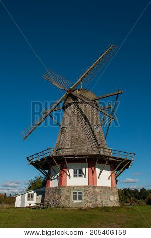 windmill on Bogoe island in Danish countryside