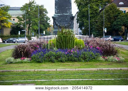 Obelisk at the Karolinenplatz in Munich at sunshine