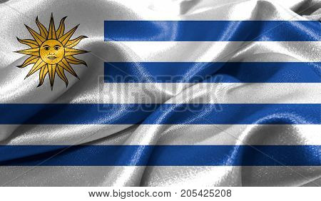 Realistic flag of Uruguay on the wavy surface of fabric. This flag can be used in design