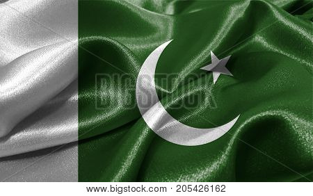 Realistic flag of Pakistan on the wavy surface of fabric. This flag can be used in design
