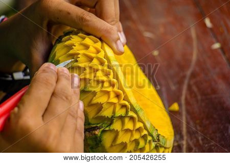 Thailand the carved pumpkin with in hand