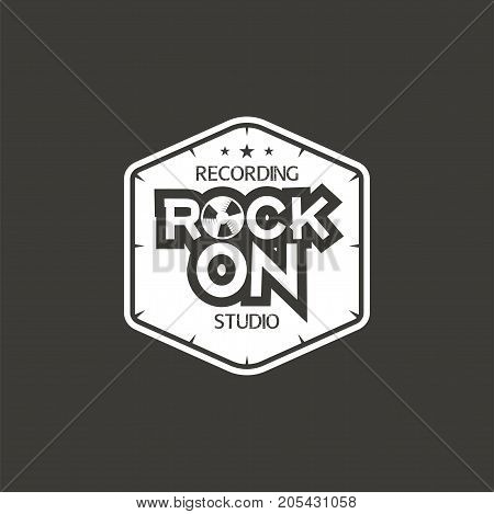 Rock on. Recording studio vector label, badge, emblem logo with musical instrument. Stock vector illustration isolated on dark background.