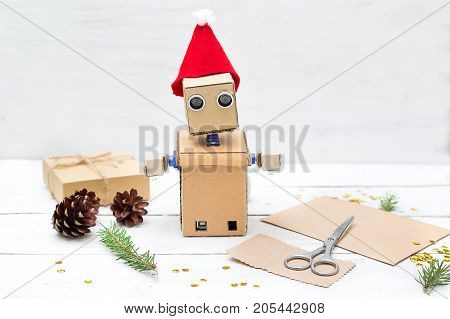 Pobot makes New Year's gifts. Christmas decorations