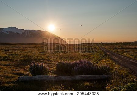Sunset Behind A Mountain In North Iceland