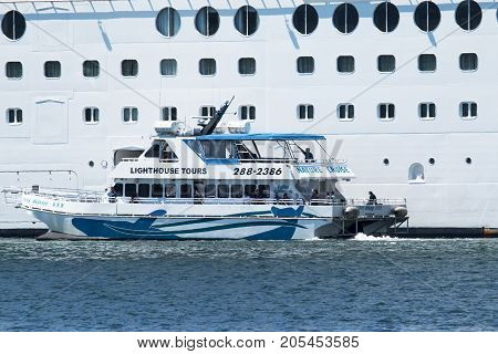 Bar Harbor Maine USA - 28 July 2017: The King Bay III of the Bar Harbor Whale Watch Company picking up passengers on a cruise ship for a whale watching nature tour.