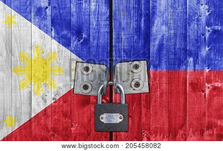 Philippines flag on door with padlock close