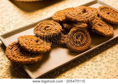 Stock Photo of Chakli or Chakali or Murukku, popular salty food made during diwali festival