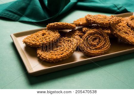 Stock Photo of Chakli or Chakali or Murukku, popular salty food made during diwali festival