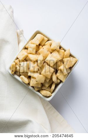 stock photo of  variety of Shakkar pare Also Know as Shakkarpare, Shakarpali, Shakkar Para, or Shankarpalli or shankar pale is a Snack Typically Made in India During Diwali