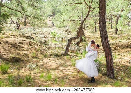 Romantic dating. Young loving couple embracing on nature.