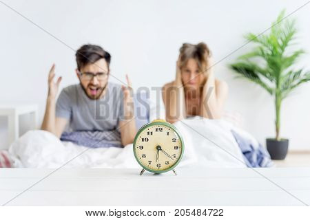A couple is overslept, they missed the alarm