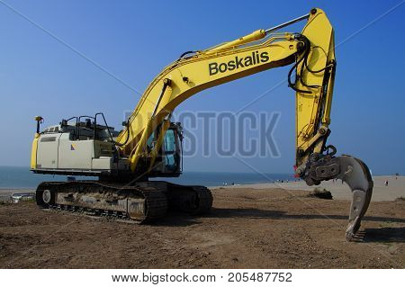 Lelystad, The Netherlands - September 24, 2017: Boskalis Caterpillar (CAT) 336E H Hydraulic Excavator sits at rest on Dutch landwinning construction site Marker Wadden.