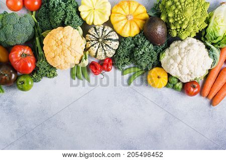 Healthy eating, colorful rainbow vegetables on the light grey background, copy space for text below, selective focus