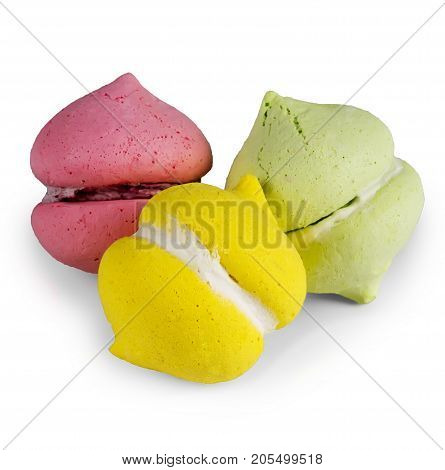Three multi-colored cakes on a white background