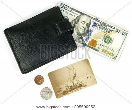 A purse money a plastic card and a trifle