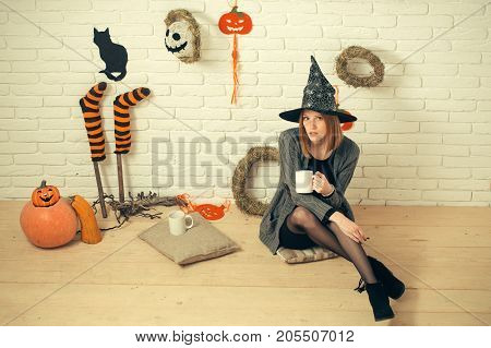 Halloween Woman In Witch Hat With Cups