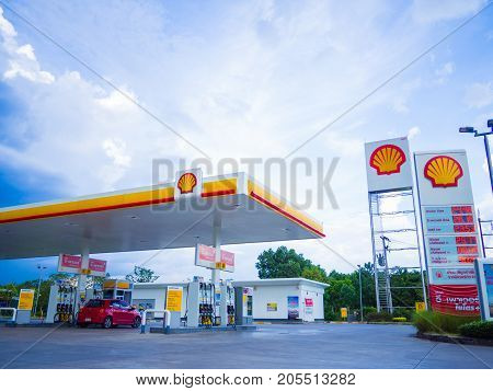 Nakhon Si Thammarat Thailand - July 2 2017: Shell gas station blue sky background. Royal Dutch Shell sold its Australian Shell retail operations to Dutch company Vitol in 2014