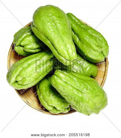 Chayote in basket on white background are healthy food