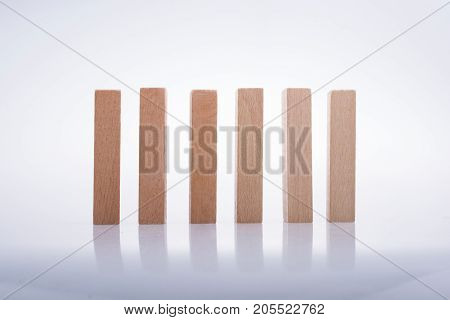 Wooden Domino Blocks On White Background