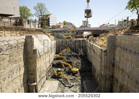 Excavators Baggers Digging At A Construction Site
