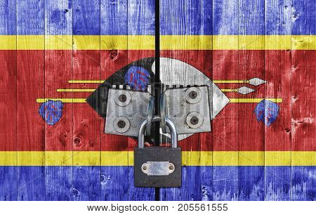 Swaziland flag on door with padlock close