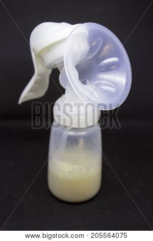 Handy breast pump with milk for not using formula