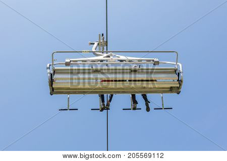 Ski Lift Chair In The Alps - Unrecognisable People In It
