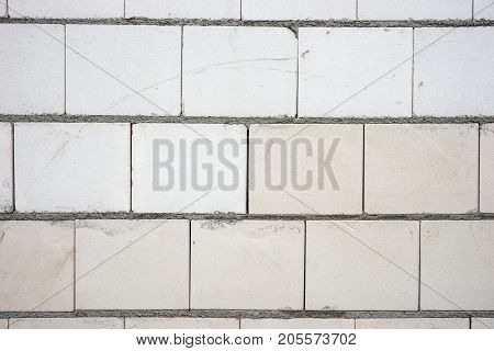 Building brick wall background. White wall texture and background