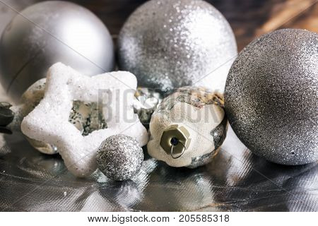 New year silver decoration on briliance background. Top view