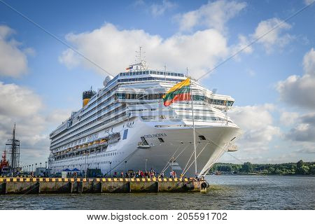 Klaipeda, Lithuania - August 20, 2017: Beautiful summer view on Klaipeda port and international cruise ship on Curonian Lagoon from The Curonian Spit, Klaipeda Lithuania.