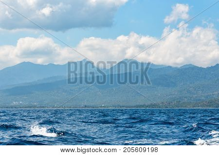 Blue sea at cloudy day in Lombok Island Indonesia.