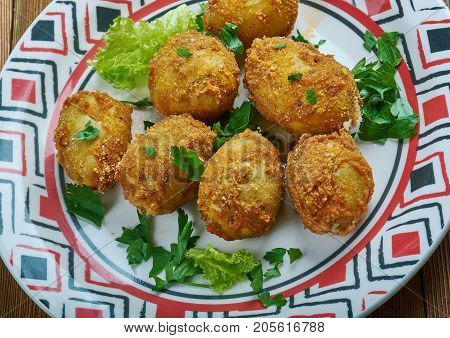 tandoori aloo tikka - spiced marinated potatoes which are either grilled or pan frie.Indian cuisine