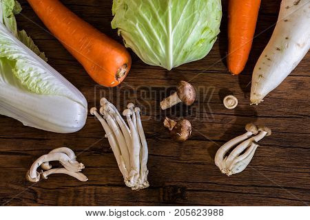 Various of raw vegetables on wooden table