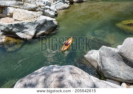 April 17, 2015 La Ceiba, Honduras: Kayaker On The Canrejal River In The Pico Bonito National Park