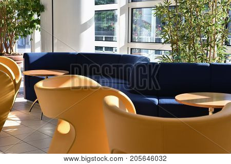 sofas and armchairs of a waiting room for travelers