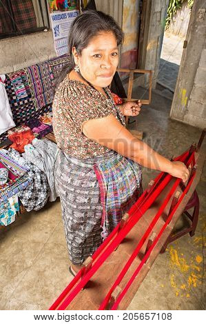 January 20, 2015 San Pedro La Laguna, Guatemala: Mayan Woman Preparing Yarn For Traditional Belt