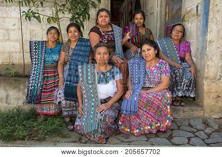 January 20, 2015 San Pedro La Laguna, Guatemala: A Group Of Tzutujil Mayan Women  Dressed In Traditi