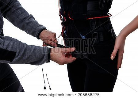 Trainer Helps Attaching Ems
