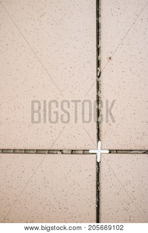 Tiling, Tile Trimming, Metering And Cutting. Repair Of The Floor. Sliced Gres Tiles.