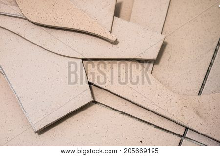 Tiling, Tile Trimming, Metering And Cutting. Repair Of The Floor. Sliced Gres Tiles.