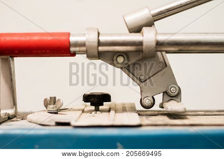 Tiling, Tile Trimming, Metering And Cutting. Repair Of The Floor. Sliced Gres Tiles.